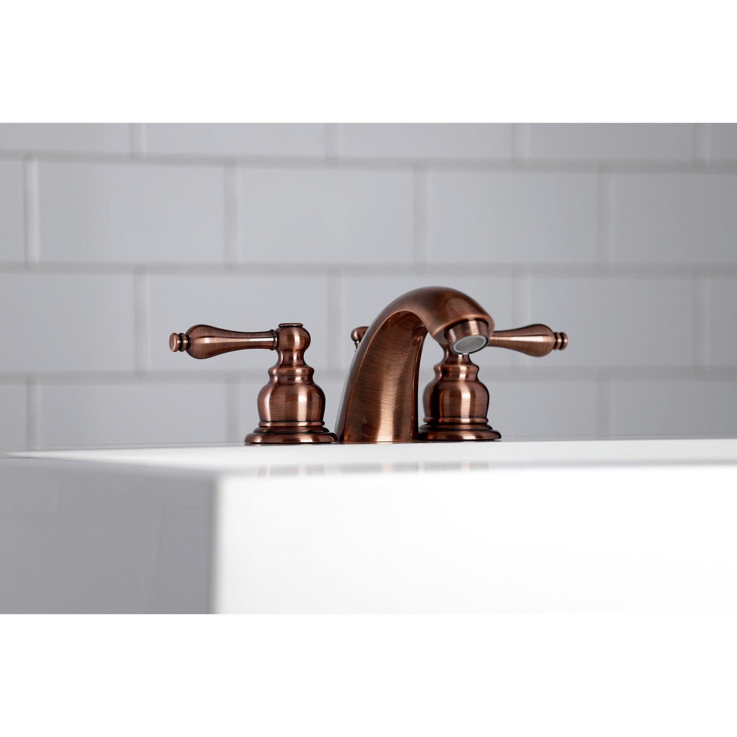 Kingston Heirloom KB946AL - Victorian Two-Handle 3-Hole Deck Mount Mini-Widespread Bathroom Faucet with Pop-Up Drain, Antique Copper — thumbnail 3