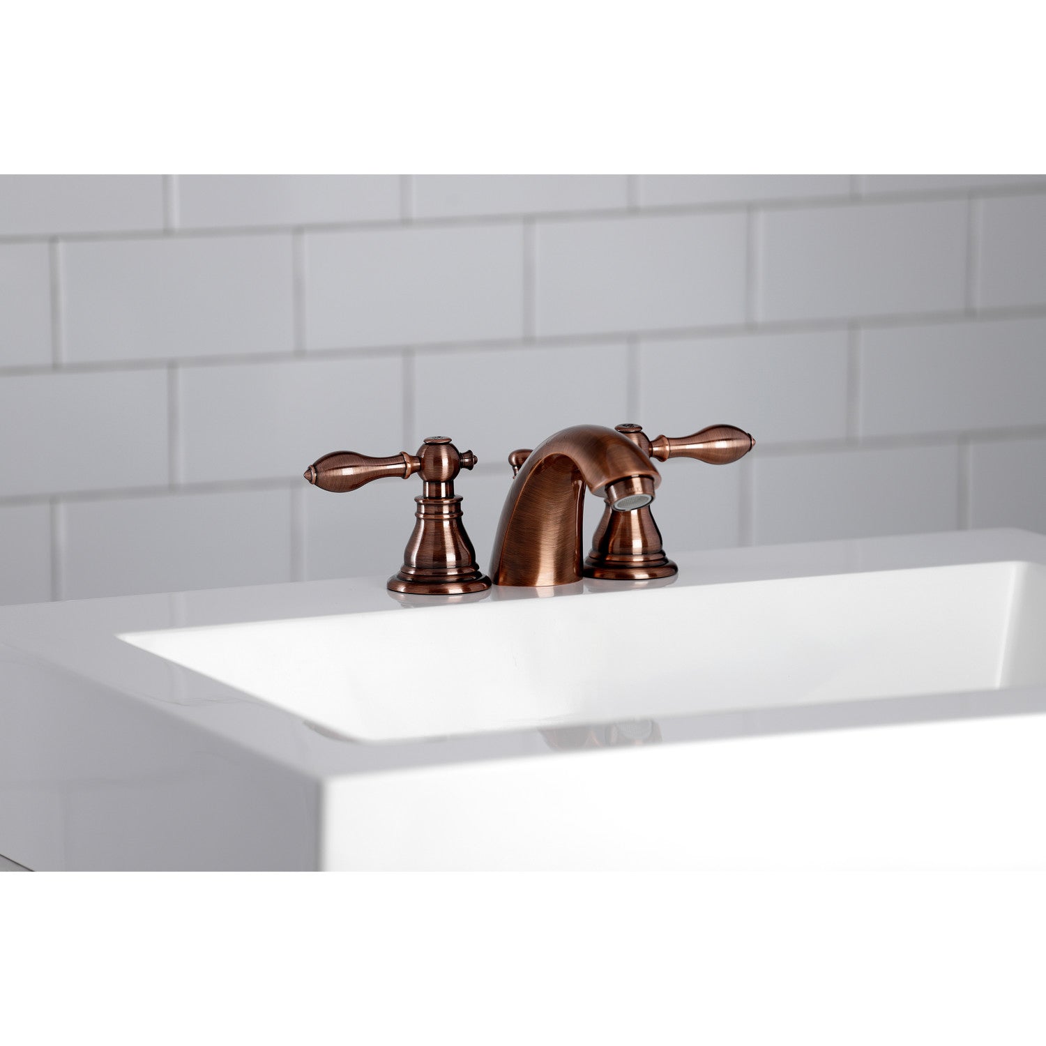 Kingston Tulare KB956ACL - American Classic Two-Handle 3-Hole Deck Mount Mini-Widespread Bathroom Faucet with Pop-Up Drain, Antique Copper — thumbnail 2