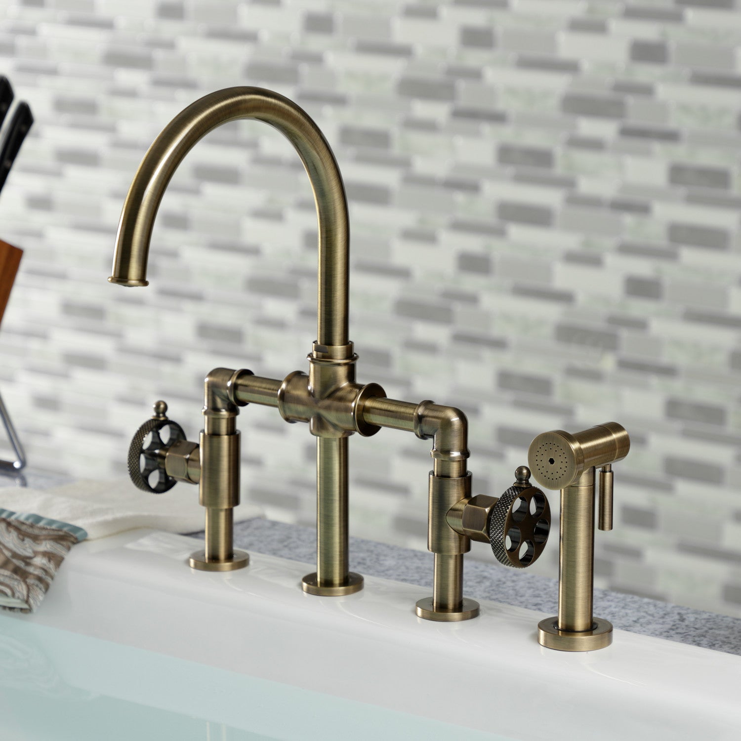 Kingston Sona KS2333RKX - Webb Two-Handle 4-Hole Deck Mount Knurled Handle Bridge Kitchen Faucet with Brass Sprayer, Antique Brass — thumbnail 2
