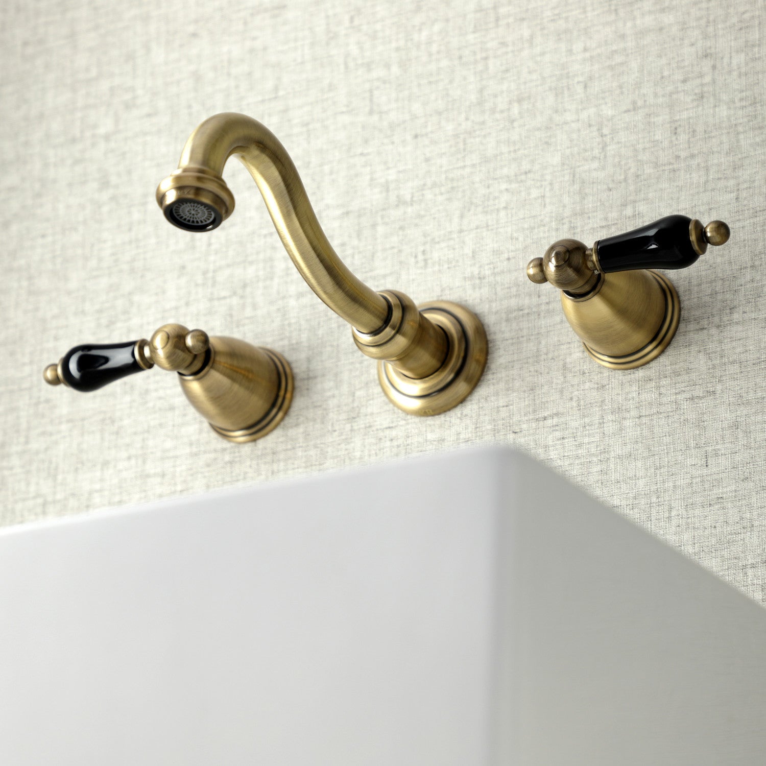 Kingston Heirloom KS3123PKL - Duchess Double-Handle 3-Hole Wall Mount Bathroom Faucet, Antique Brass — thumbnail 3